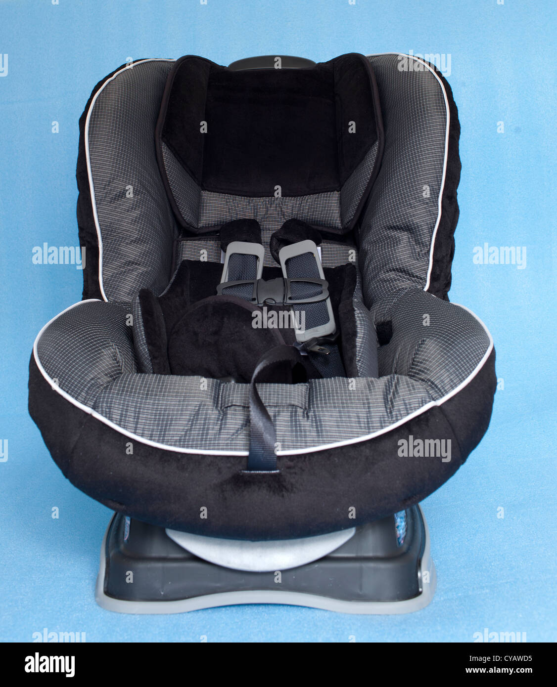 A child's car seat isolated on the clean background Stock Photo
