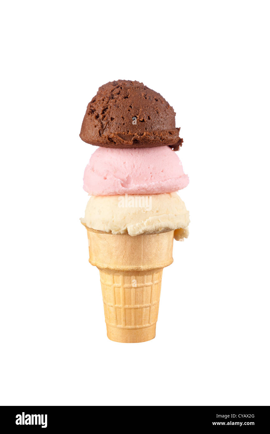 An ice cream cone with vanilla, chocolate and strawberry ice cream scoops isolated on white. Stock Photo