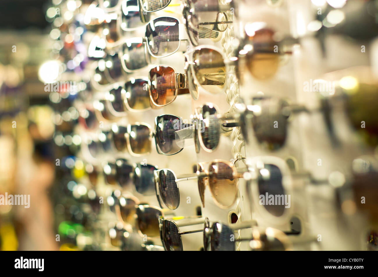 sunglasses shades on sale, display on rack. Stock Photo
