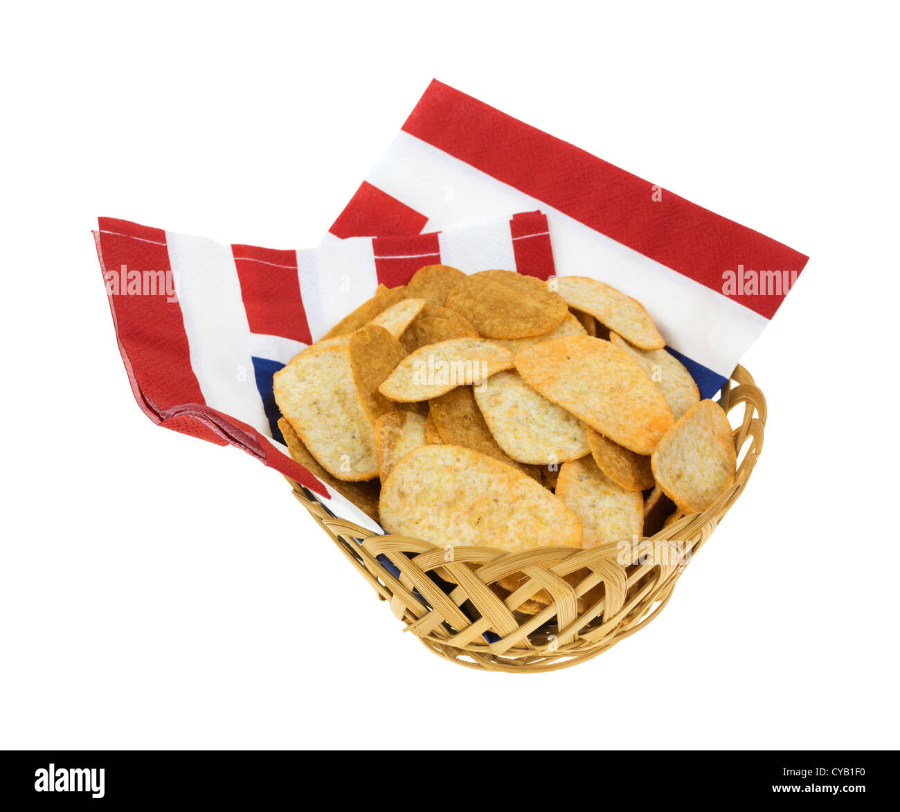 A small basket filled with potato skins and two red white and blue napkins on a white background. Stock Photo