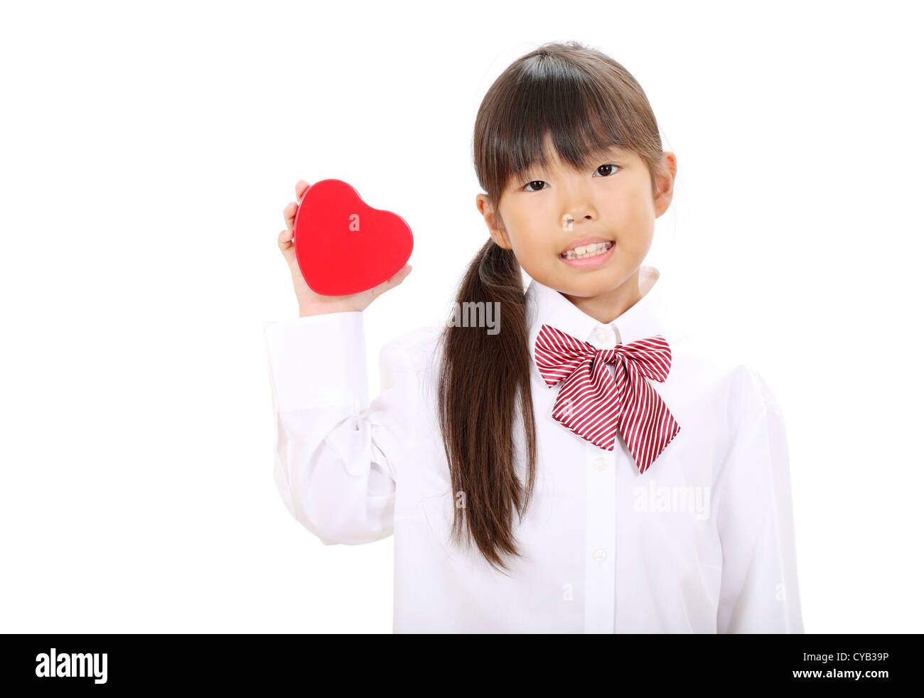little asian schoolgirl Smiling little asian schoolgirl with heart Stock Photo - Alamy