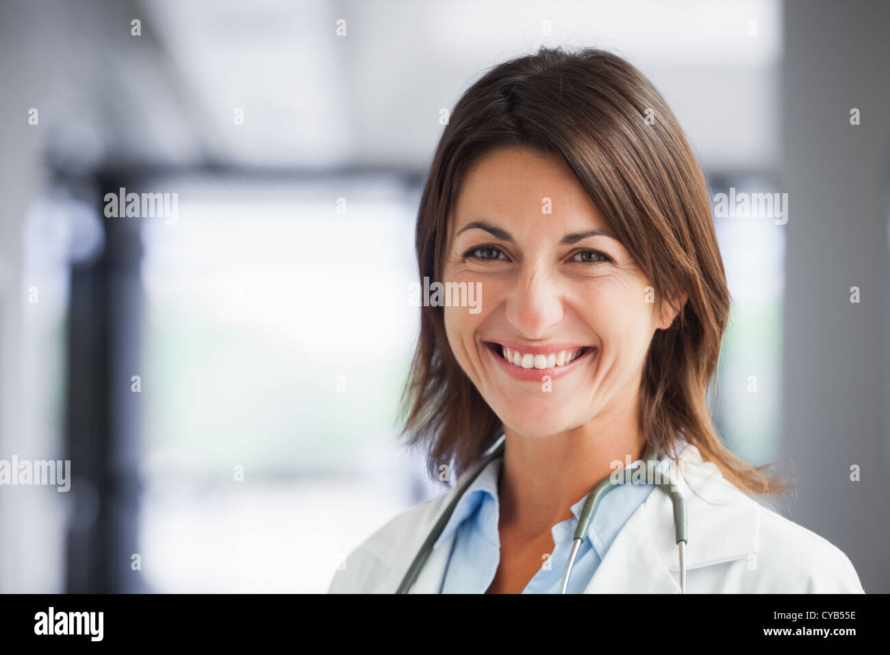 Smiling female doctor Stock Photo - Alamy