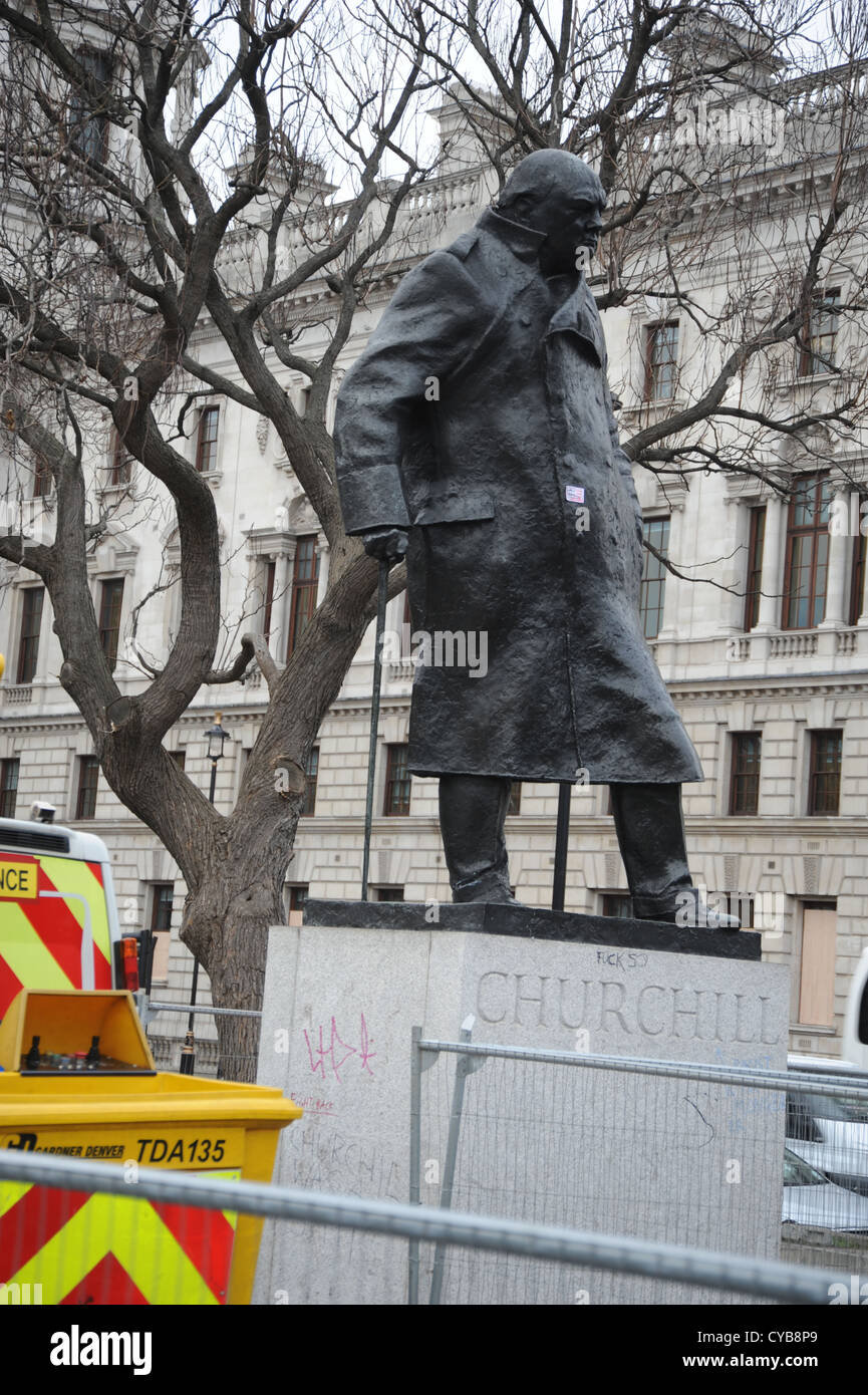 Graffiti on base of Churchill statue in Parliament Square after student protest Stock Photo