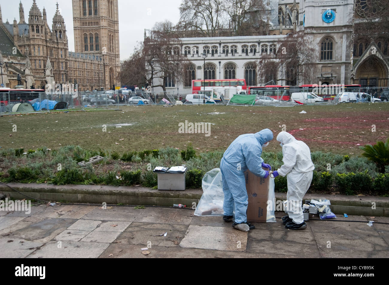 Police collecting evidence in parliament Square after student demonstrations Stock Photo