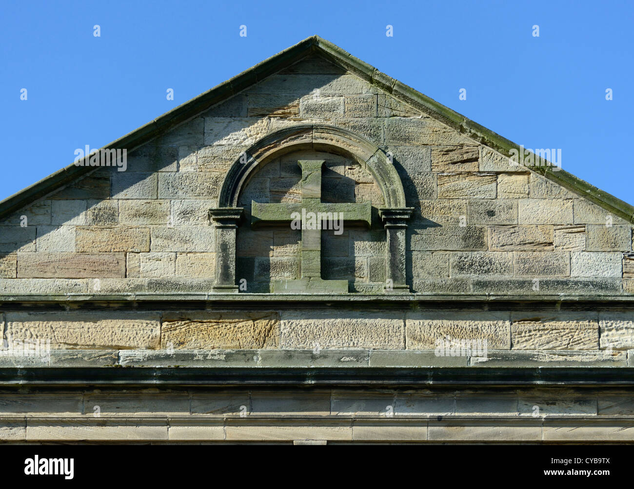 Tympanum with round arch and cross design. Church of Saint Bridget. Moresby, Cumbria, England, United Kingdom, Europe. Stock Photo