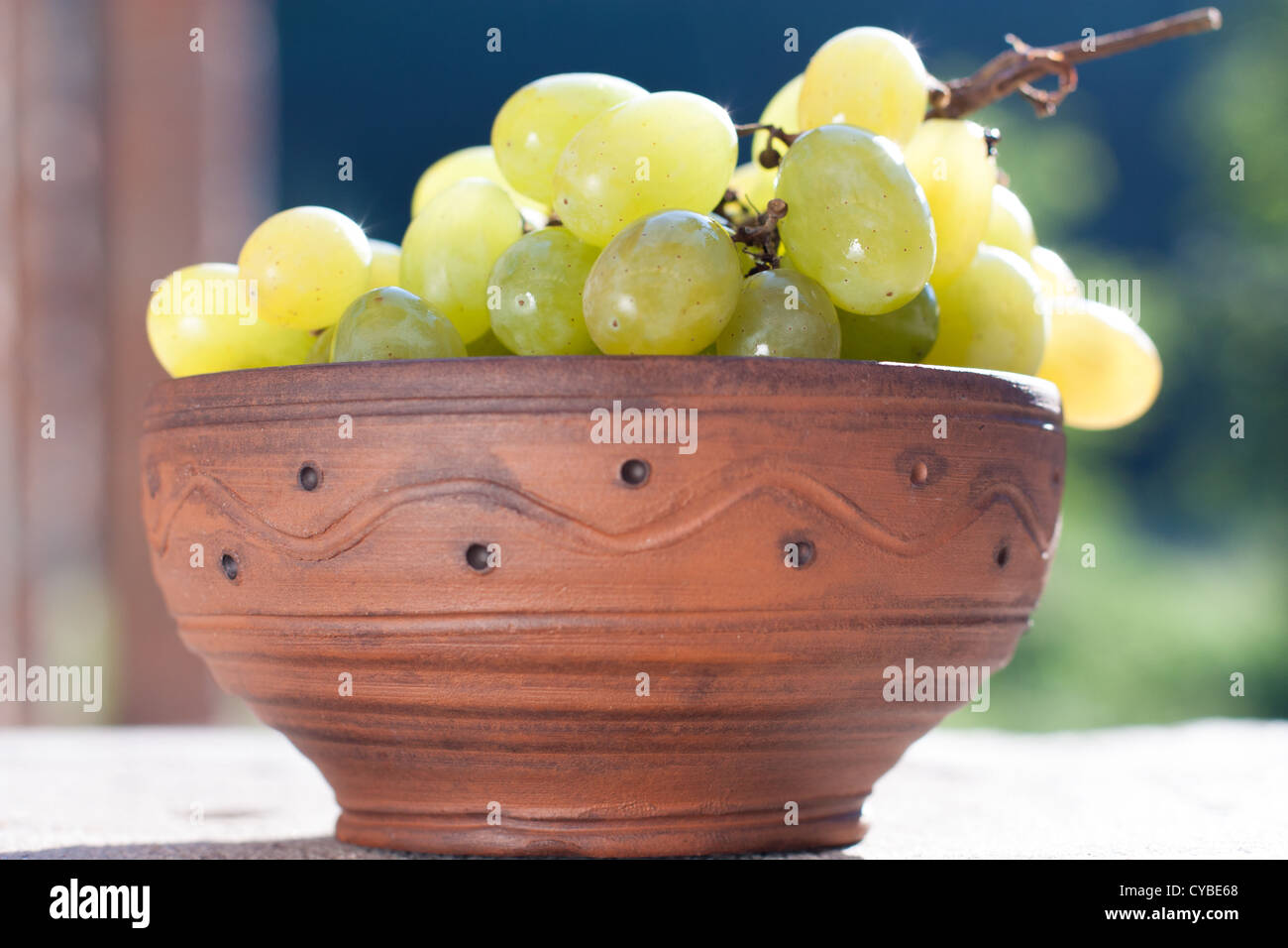 Bunch of grapes in a ceramic bowl, muscatel Stock Photo