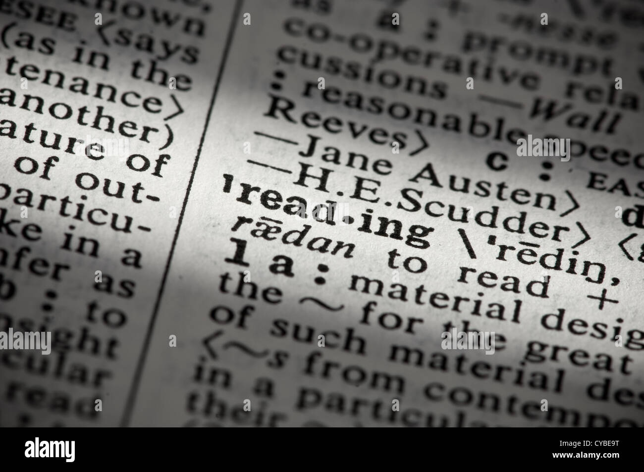 Closeup of a page in an English dictionary with the syllabicated word