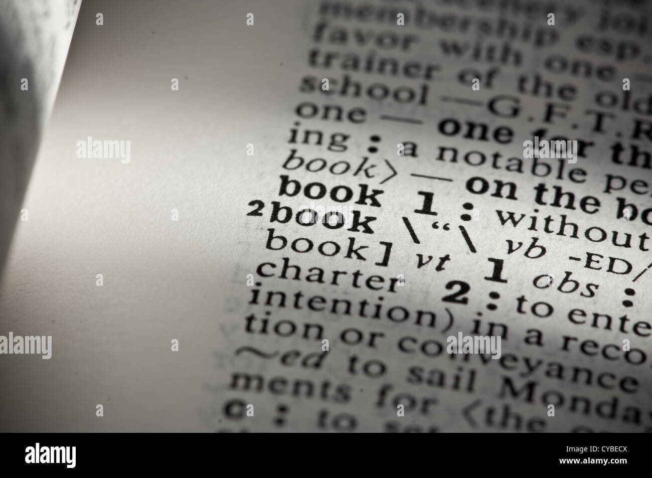 Closeup of a page in an English dictionary with the word "book