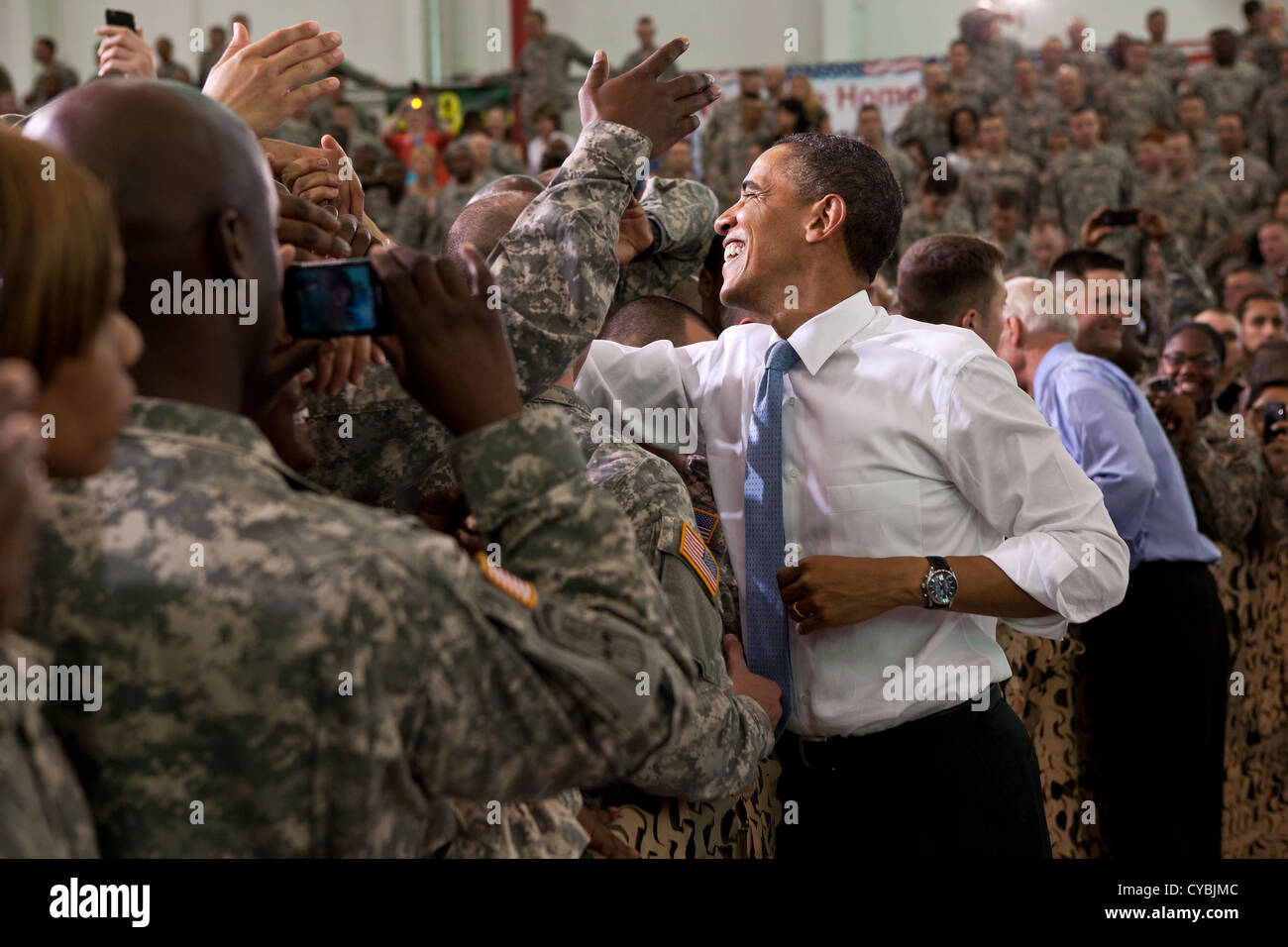 US President Barack Obama and Vice President Joe Biden shake hands with the troops following the President's remarks May 6, 2011 at Fort Campbell, Kentucky. Stock Photo