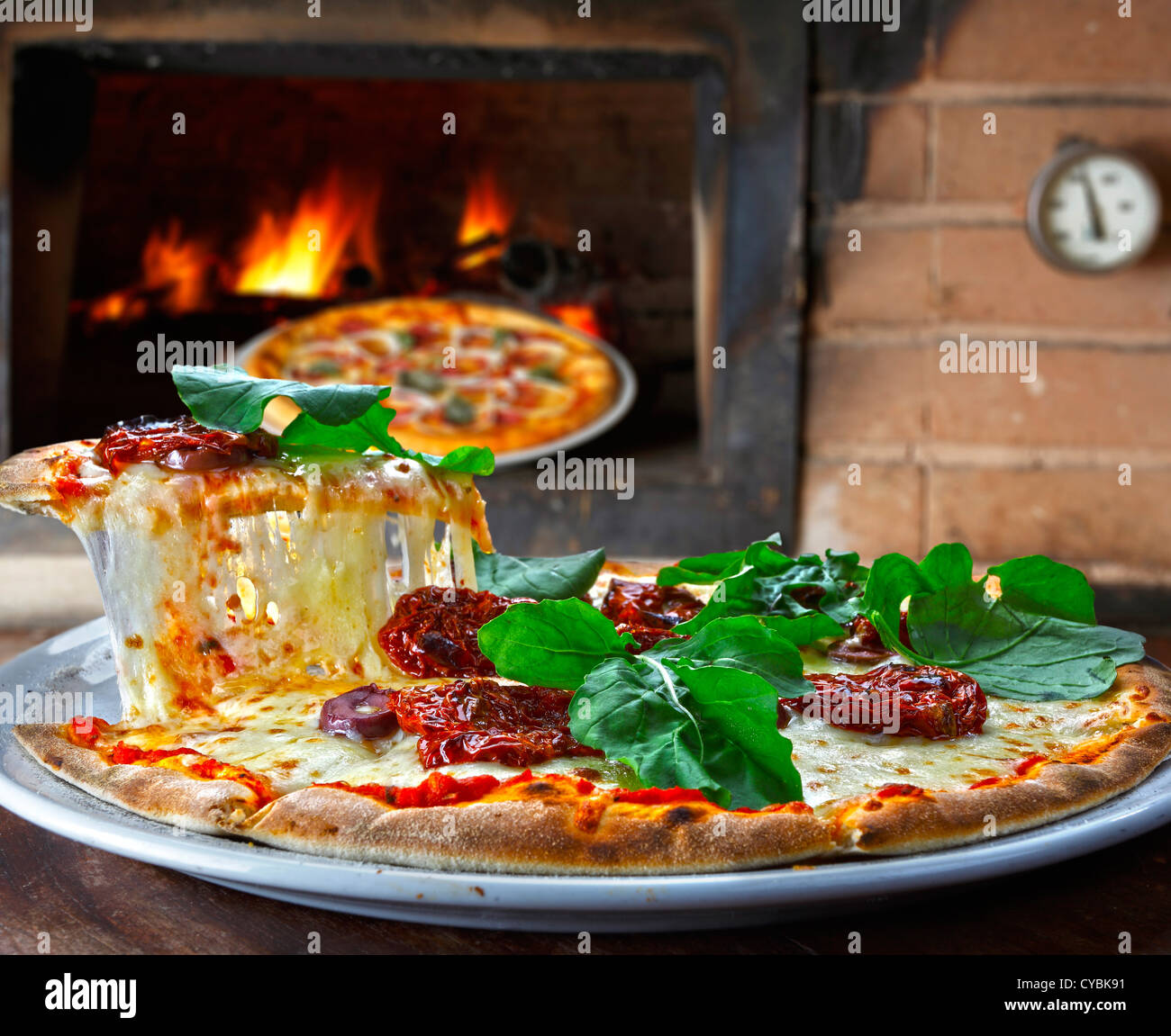 Wood oven baked pizza Stock Photo Alamy