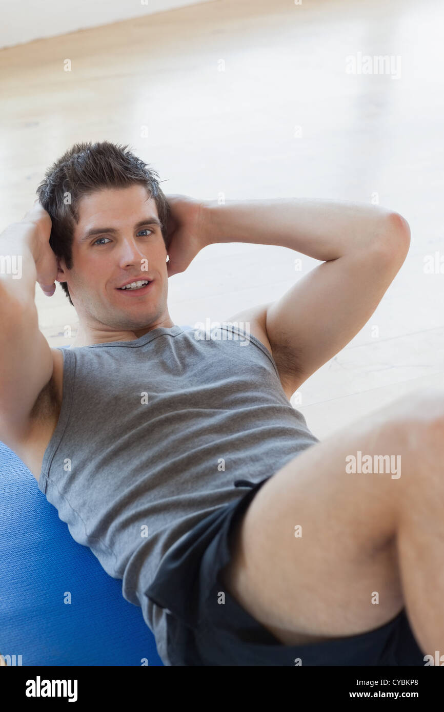 Man doing sit ups Stock Photo Alamy