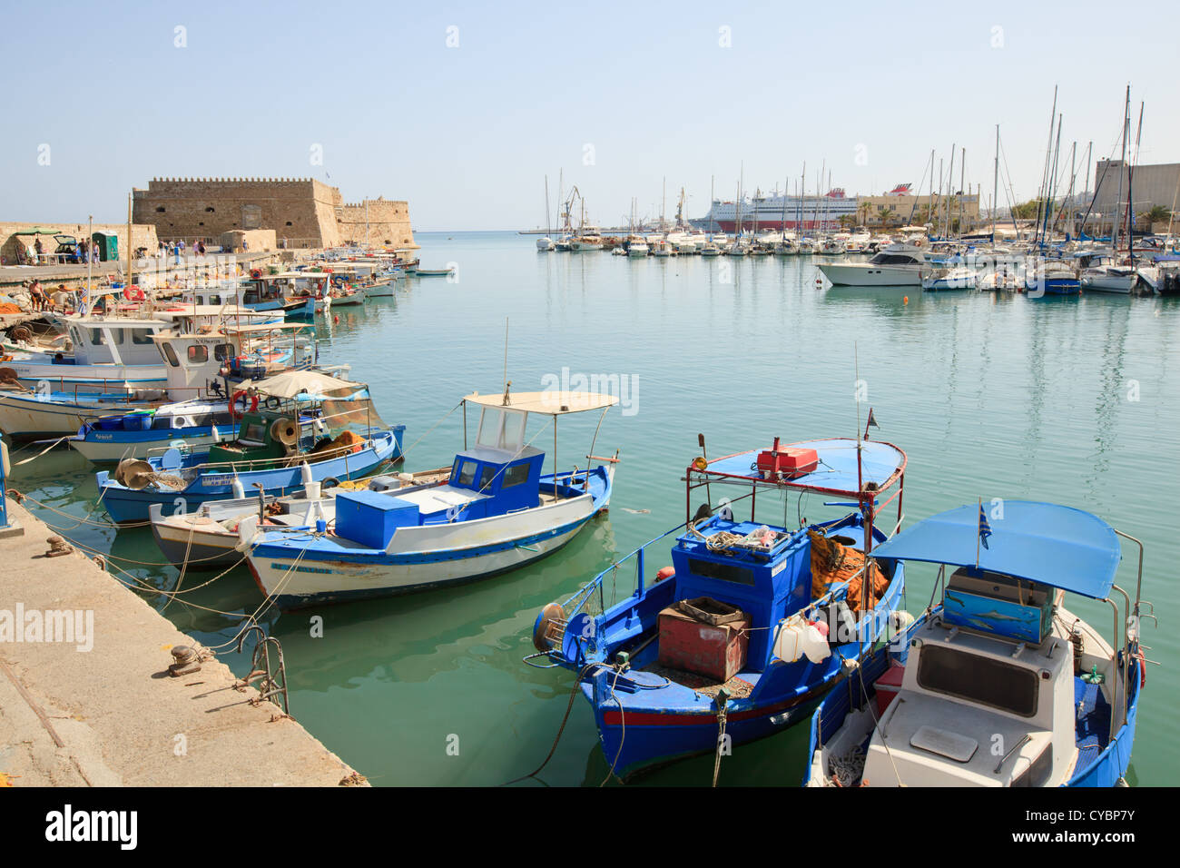 Venetian Fortress and fishing boats at Heraklion Harbour harbor on the Greek island of Crete, Greece. Stock Photo