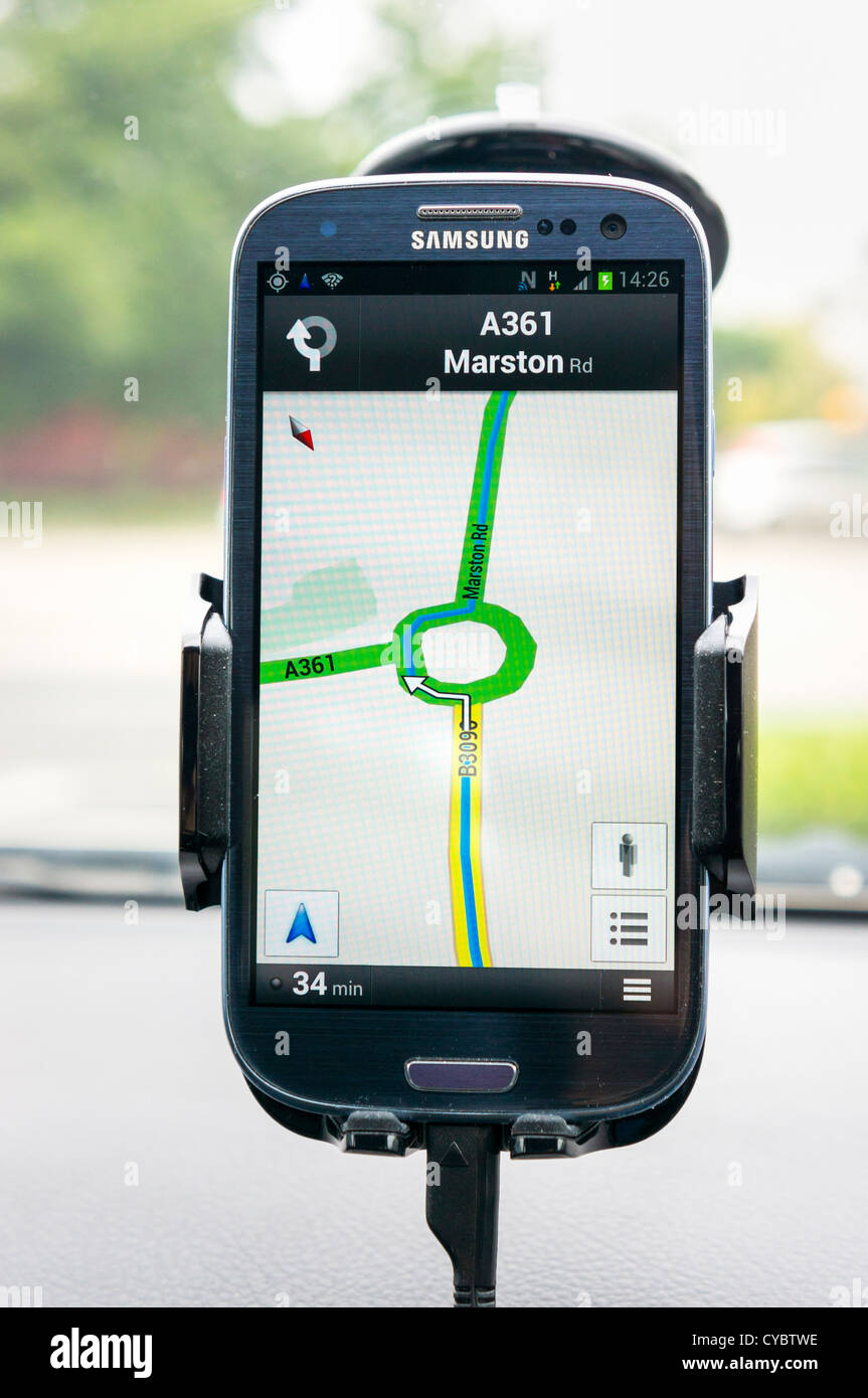 Google maps gps sat nav on a smartphone inside a car Stock Photo