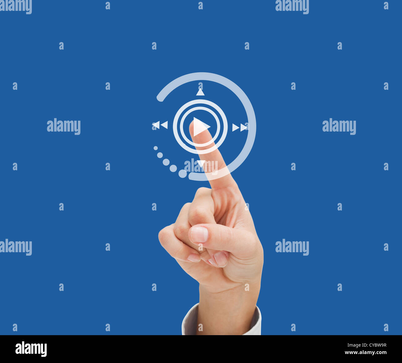 Finger selecting play button Stock Photo