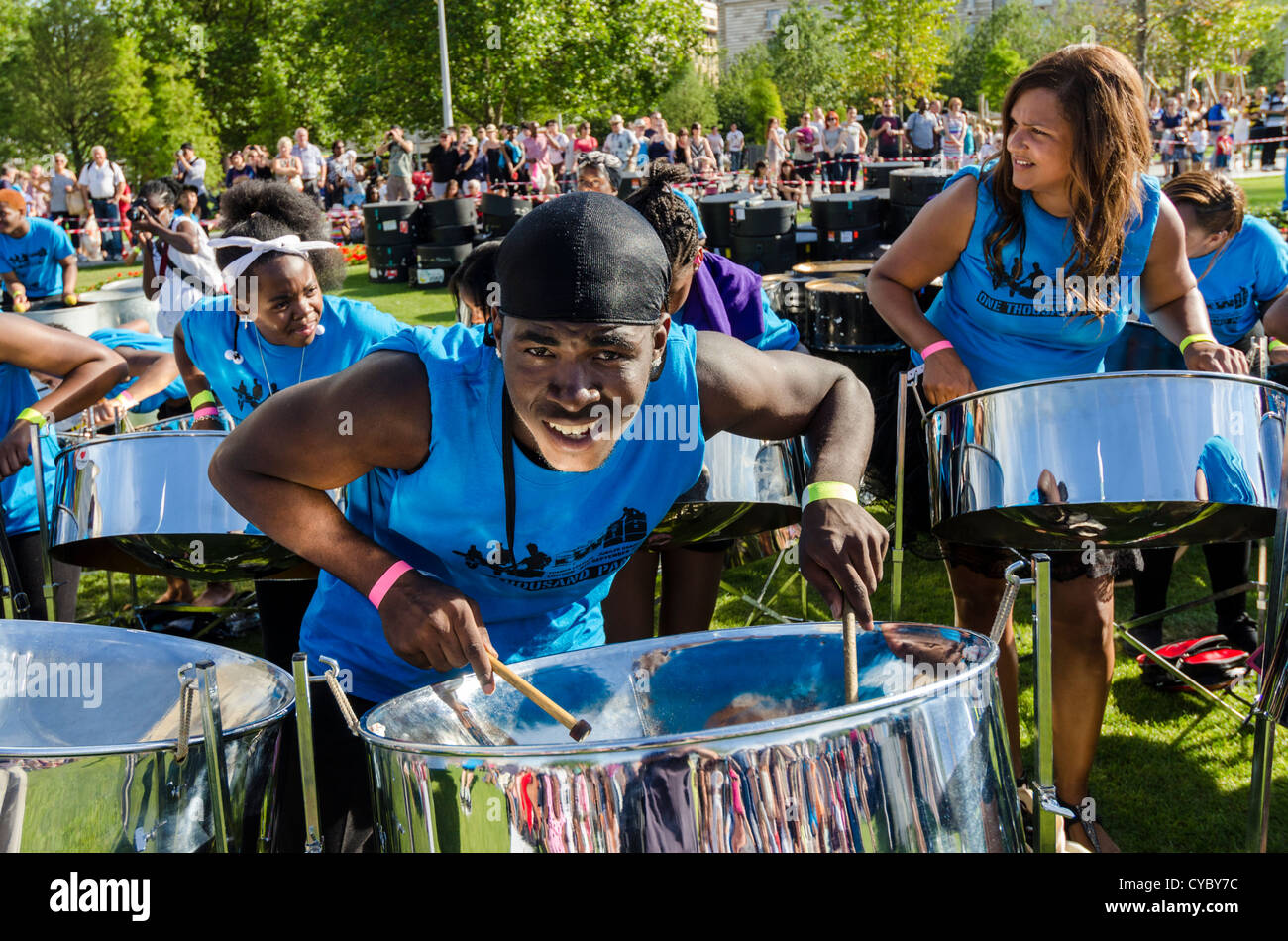 Steel pan (steel drums) players at the Thames Festival 2012. Performance of One Thousand Pans by Brent Holder & Fiona Hawthorne Stock Photo