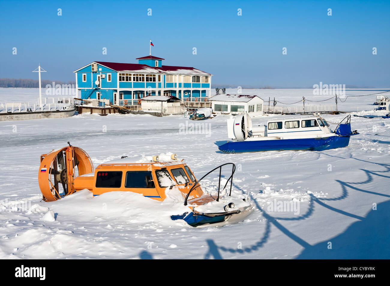 Hovercraft on the bank of frozen river Stock Photo