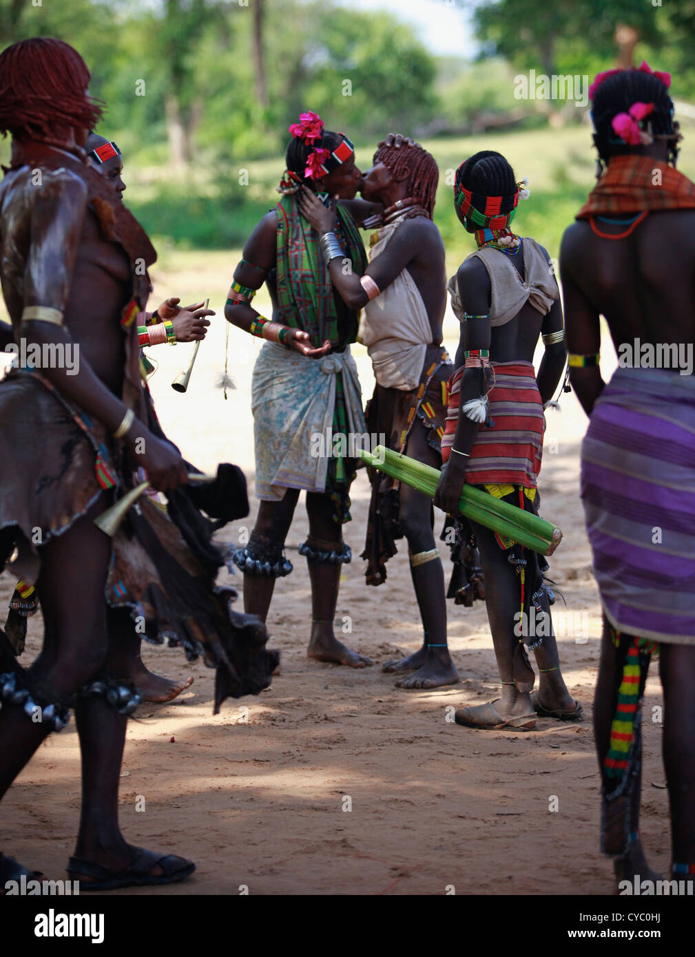 Tribal Hamar women flirting during a Bull Jumping Ceremony. Stock Photo