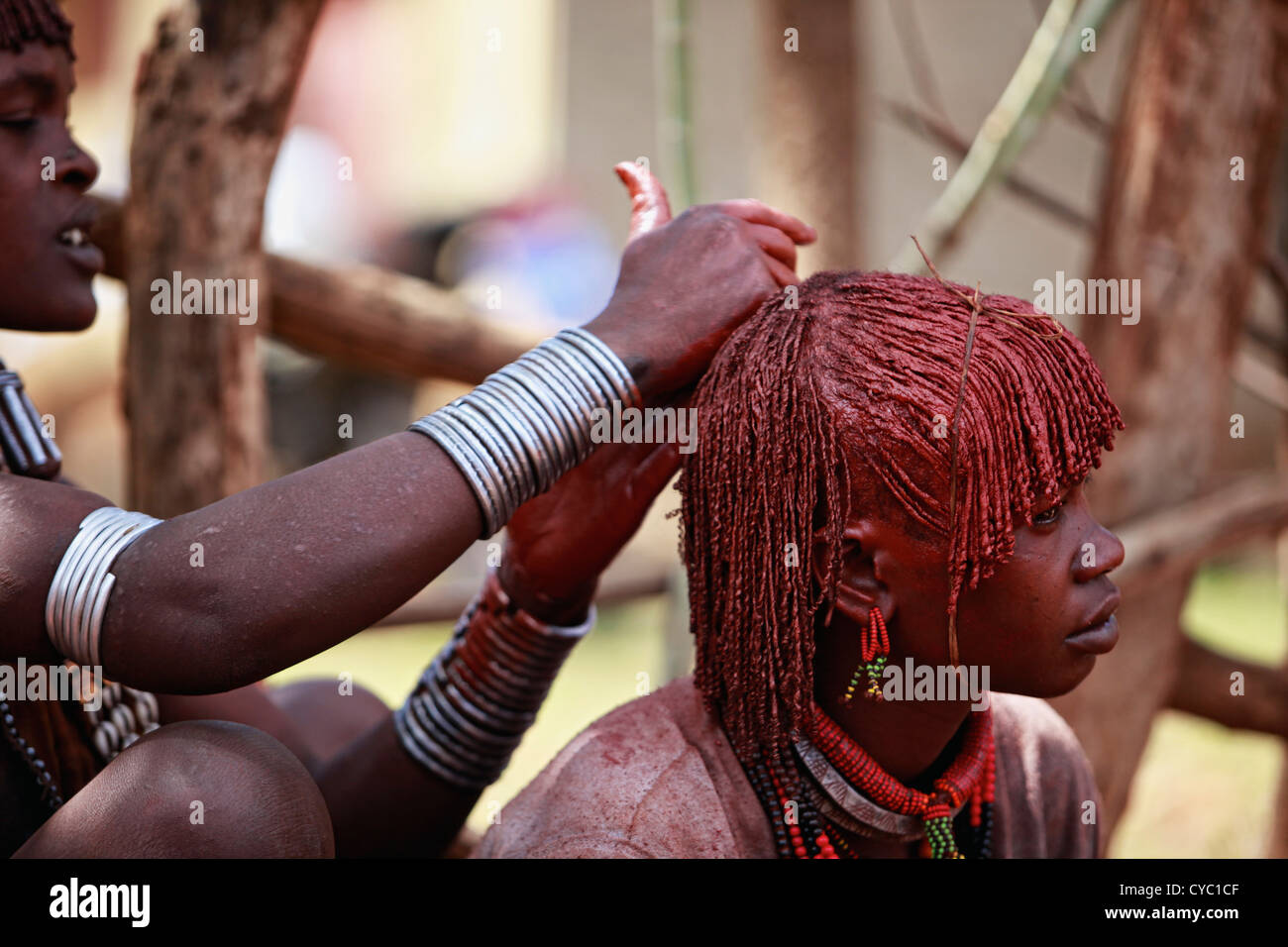 Women Rolling Hair Into Dreads Called Goscha Stock Photo 51281007