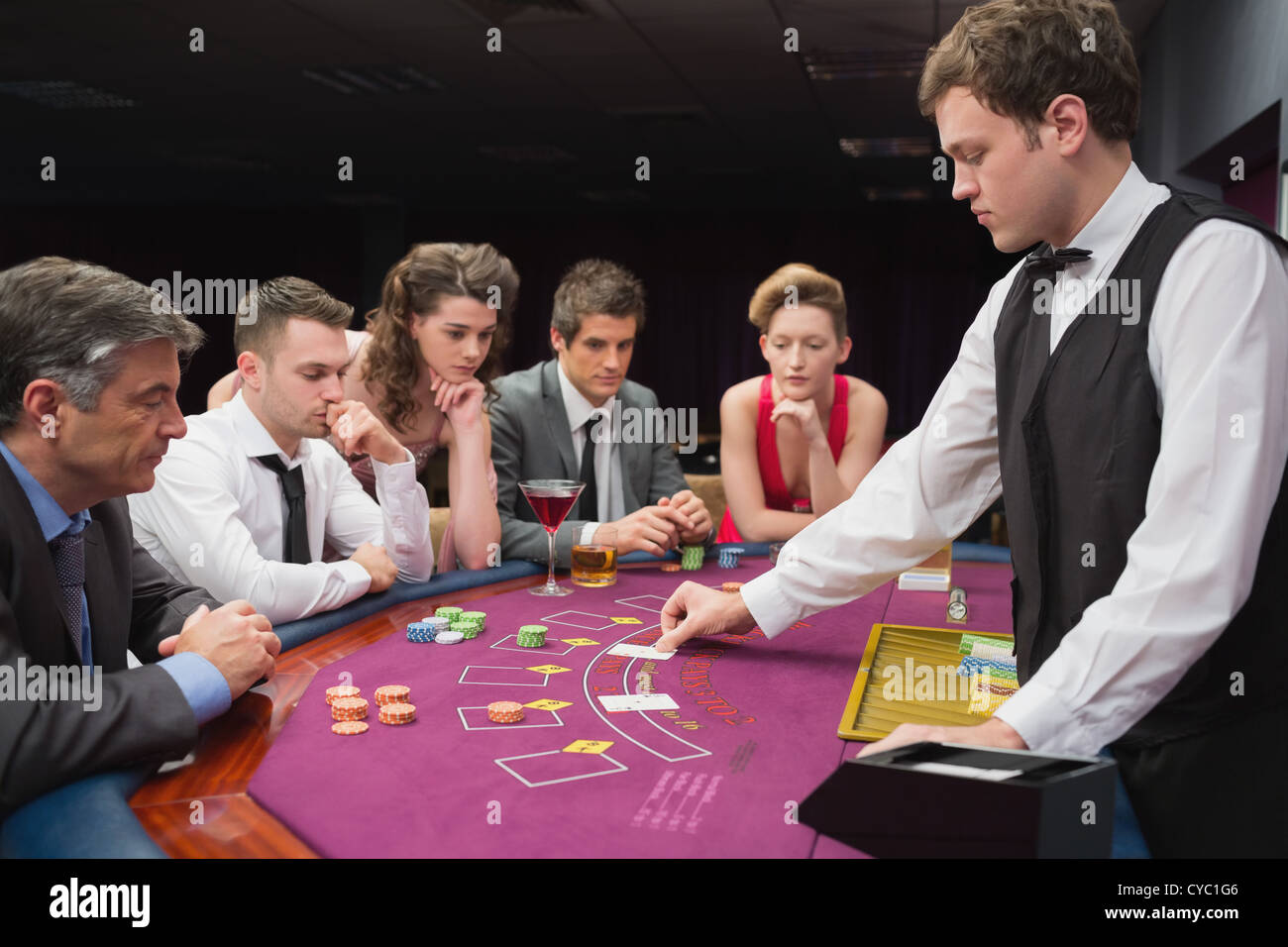 People playing poker Stock Photo
