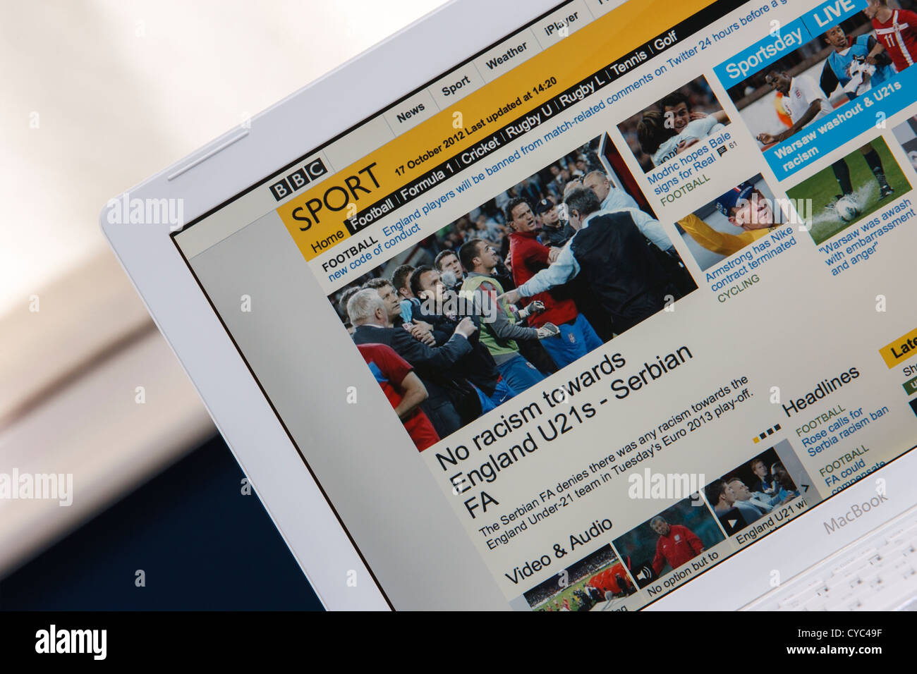 A web page from the BBC sport website is photographed being viewed on a laptop computer screen. Stock Photo