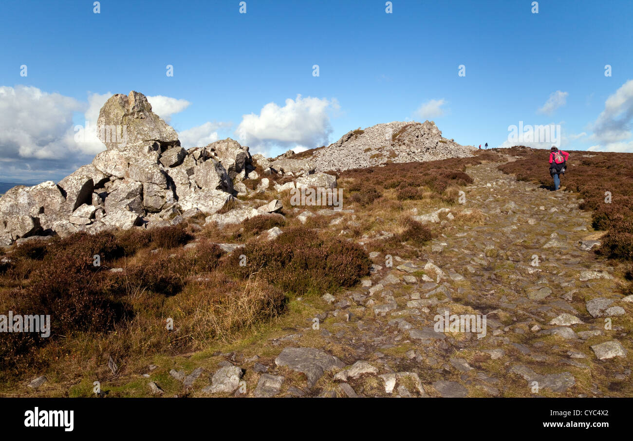 Walkers on the Stiperstones National Reserve hiking towards Manstone Rock, Shropshire UK Stock Photo