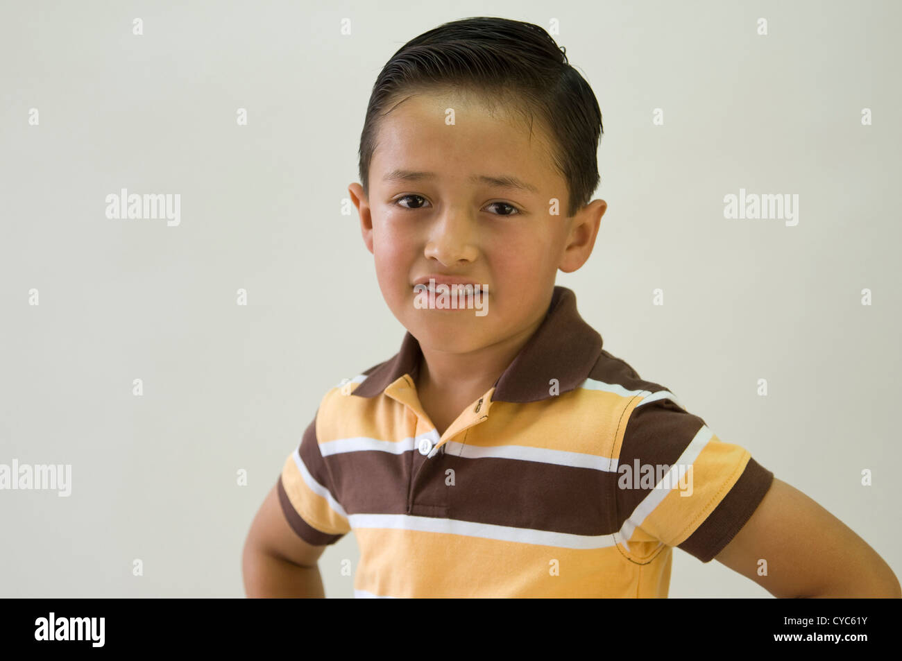 Latin boy looking at camera Stock Photo Alamy