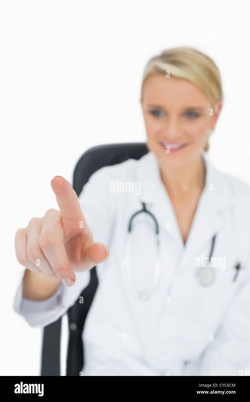 Doctor selecting something Stock Photo - Alamy
