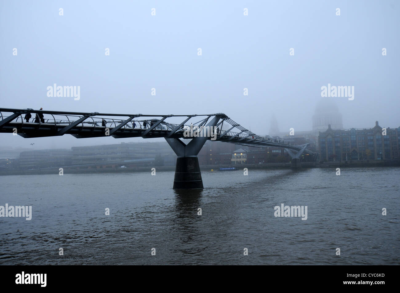 Millennium Bridge and st paul's  in the mist, from bank side, London, UK Stock Photo