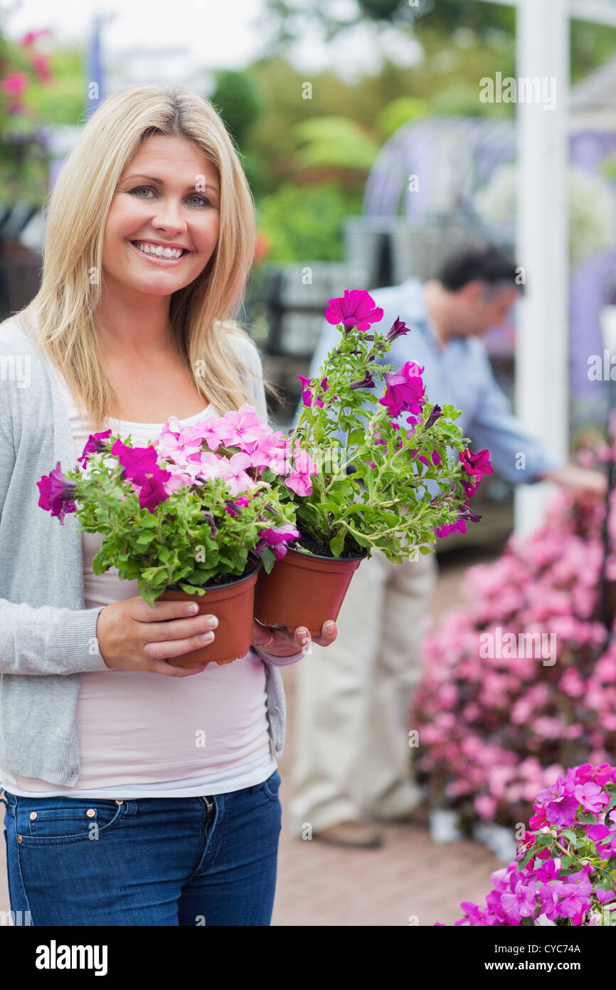 Customer carrying flowers Stock Photo Alamy