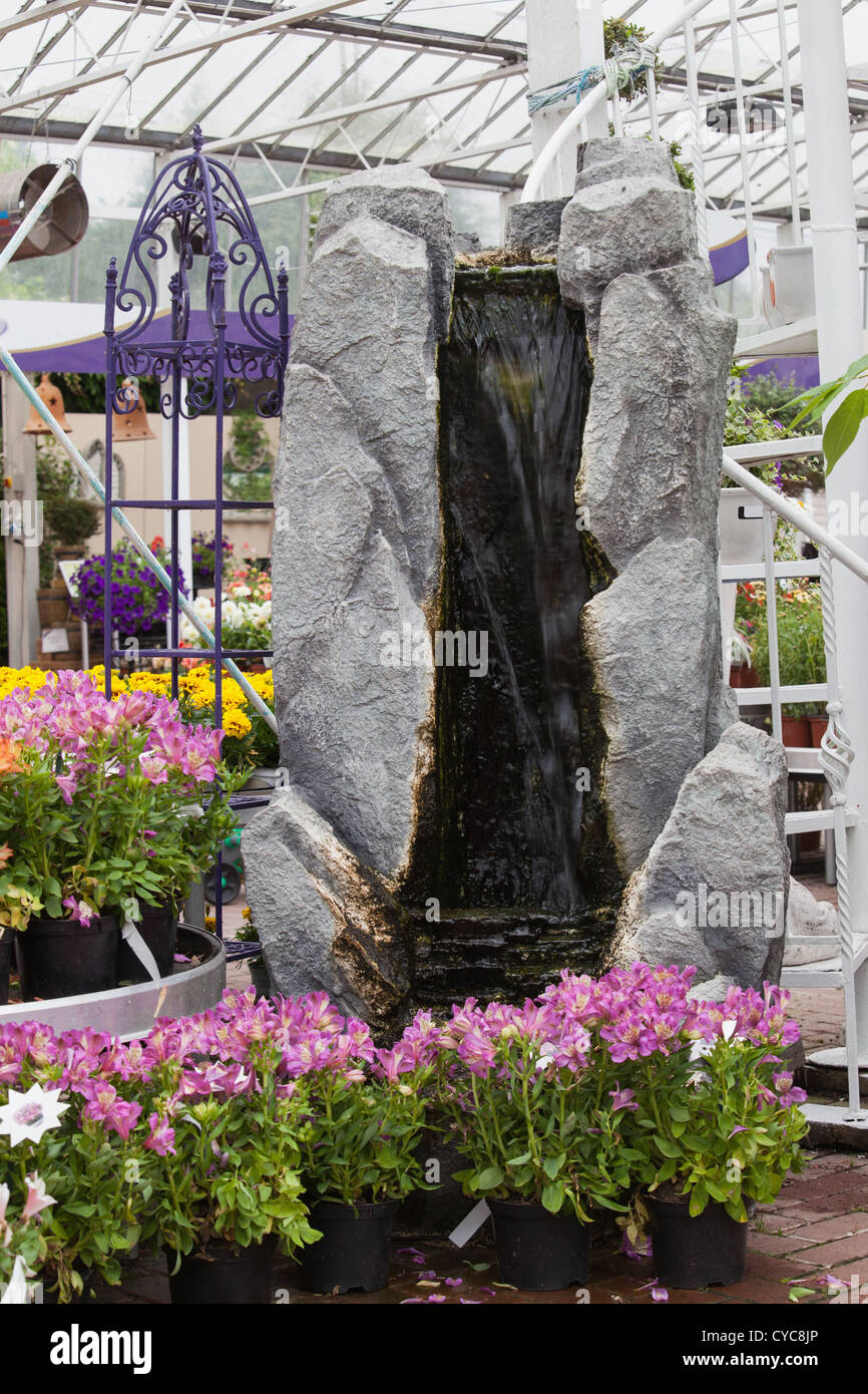 Artificial waterfall in garden center Stock Photo
