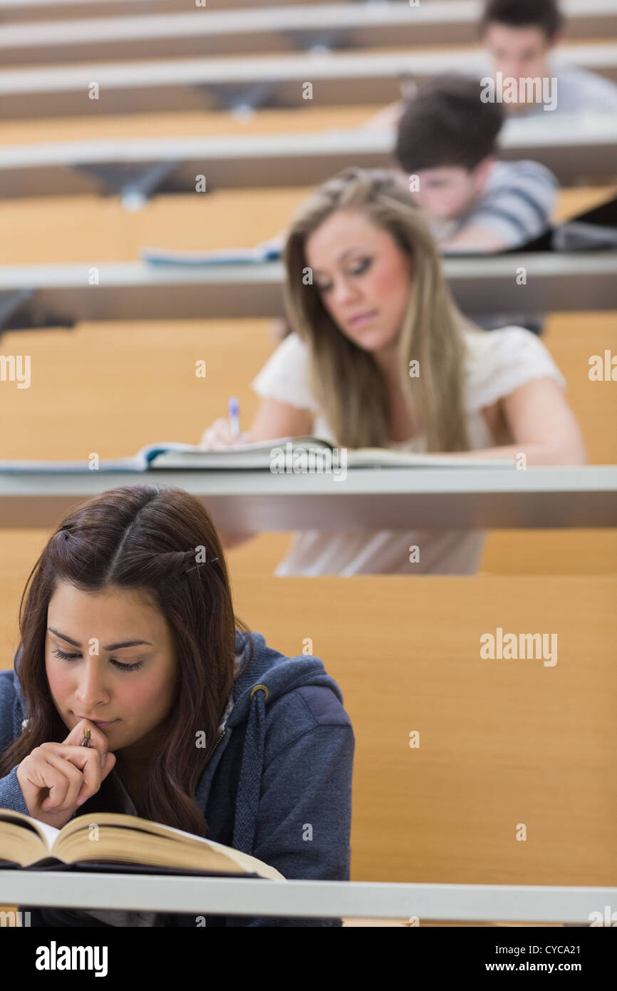 Students sitting while learning Stock Photo - Alamy