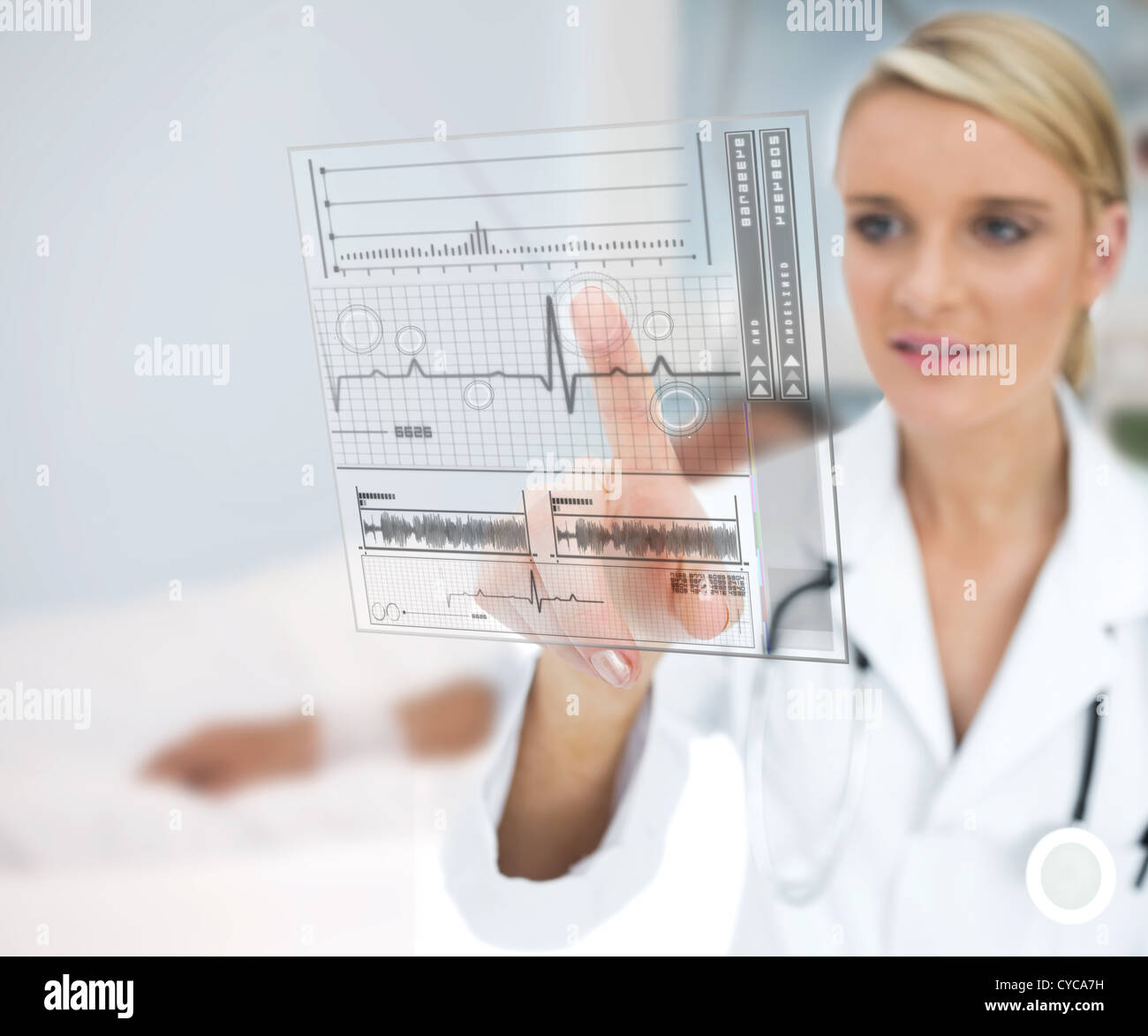 Doctor using ECG interface Stock Photo