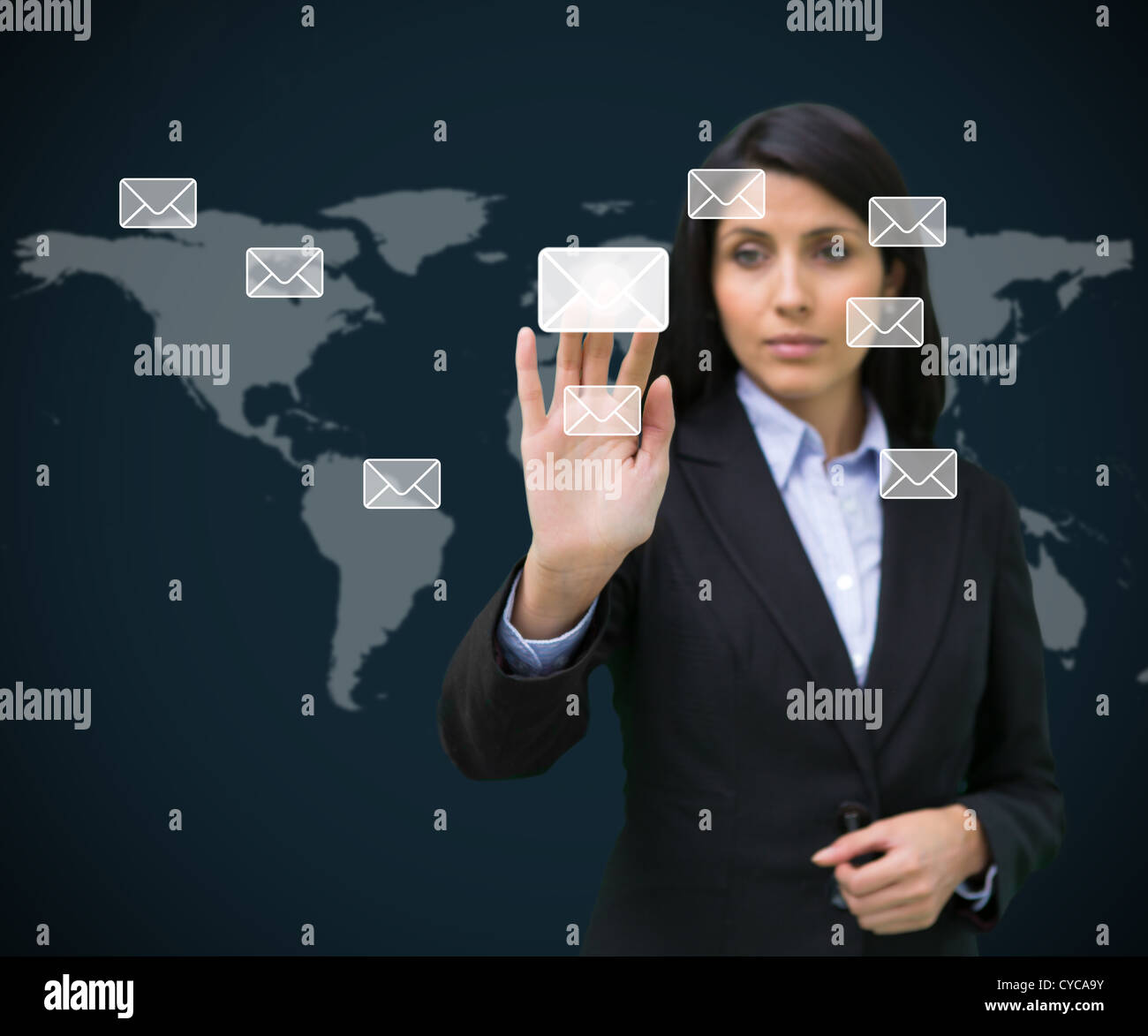 Businesswoman touching at a message symbol Stock Photo