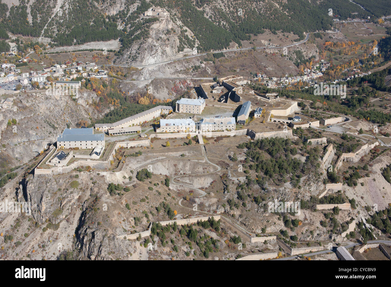 AERIAL VIEW. Fort des trois Têtes overlooking the Durance Valley. Military fort by famed architect Vauban. Briancon, Hautes-Alpes, France. Stock Photo
