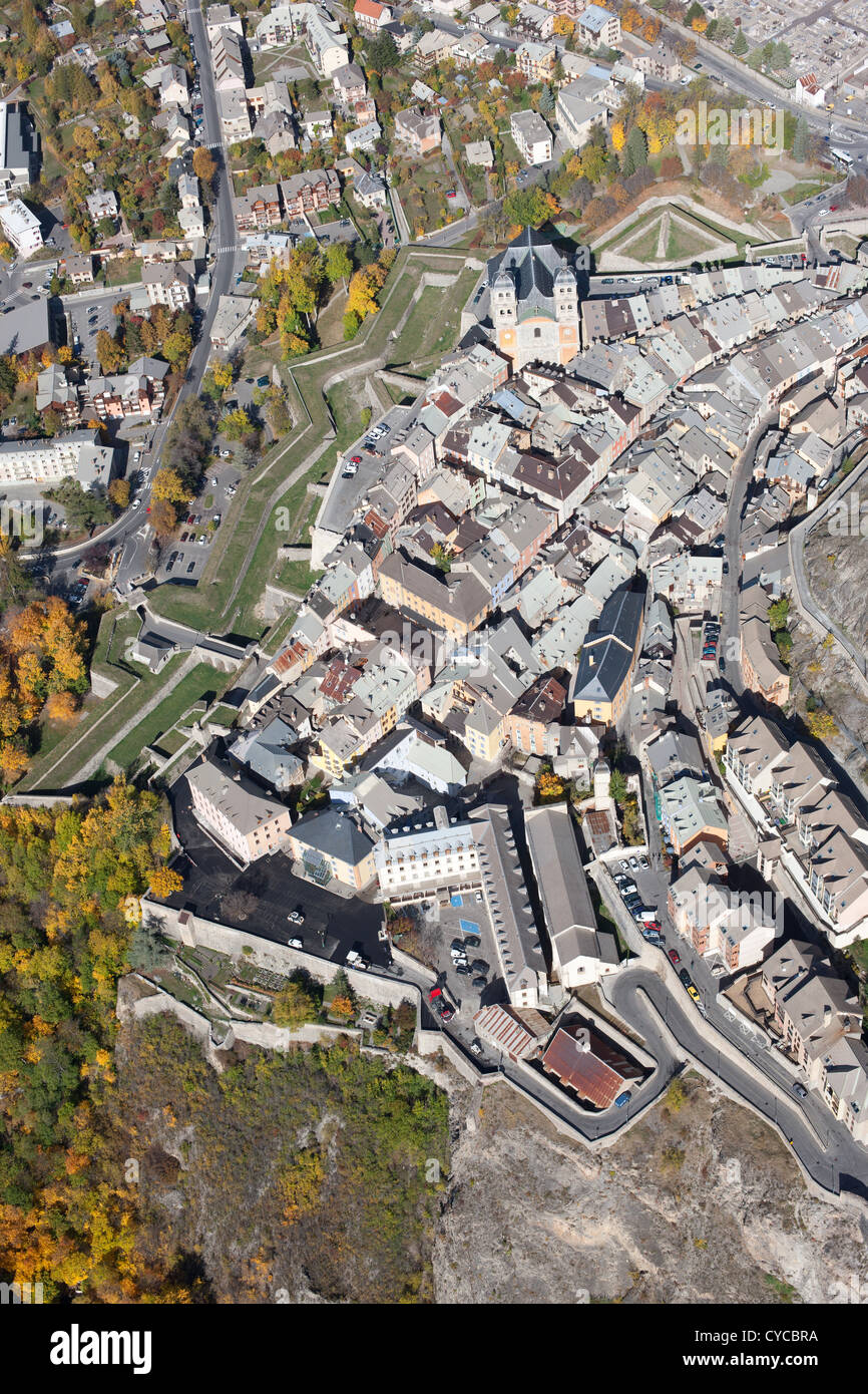 AERIAL VIEW. The old town of Briançon on a rocky spur with its fortifications built by Vauban. Listed as a UNESCO site. Hautes-Alpes, France. Stock Photo