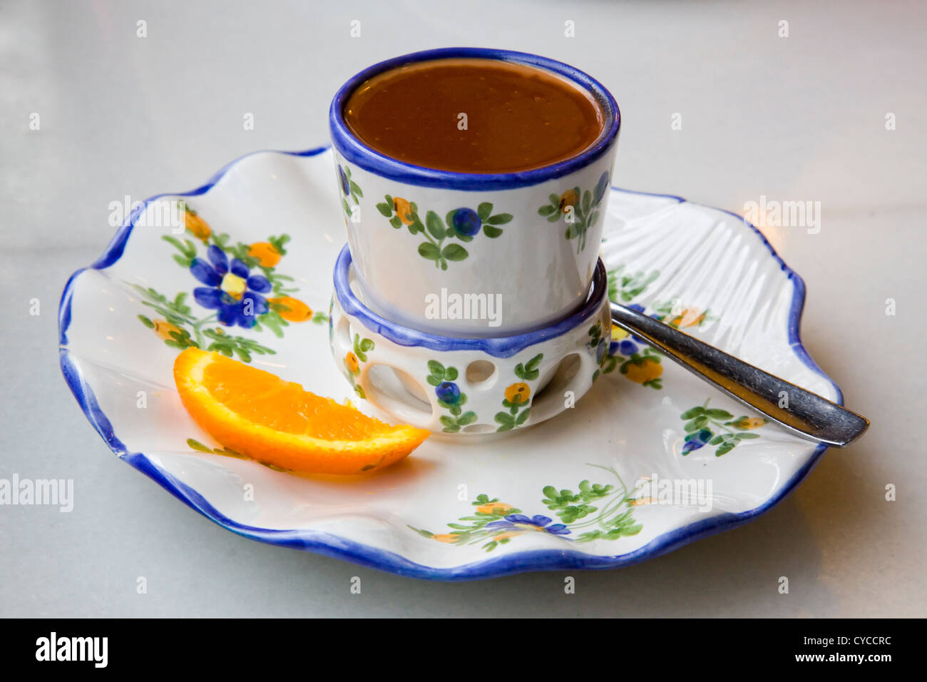Hot chocolate served in a decorated porcelain cup Stock Photo