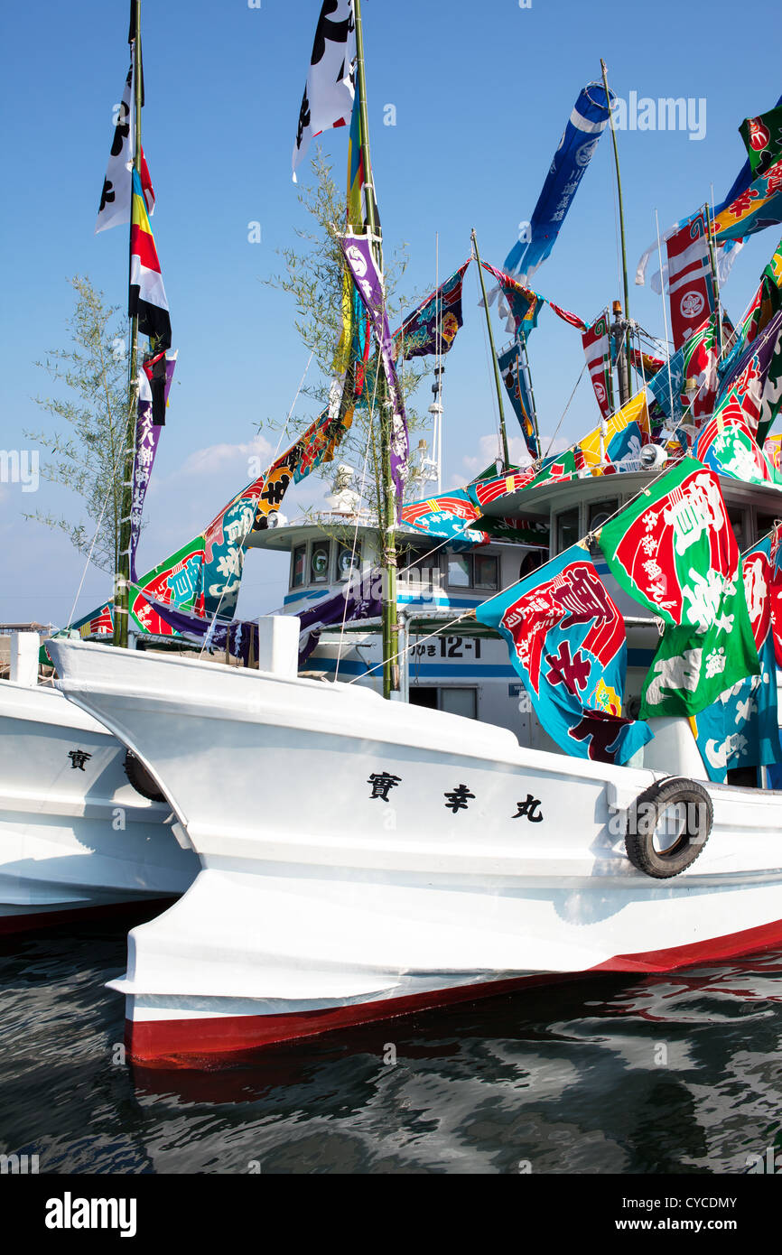 Fishing boat, beautifully decorated nautical flags Stock Photo - Alamy