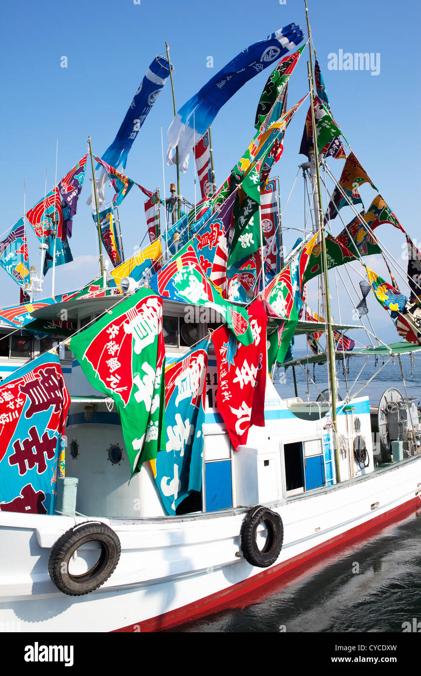 Fishing boat, beautifully decorated nautical flags Stock Photo - Alamy