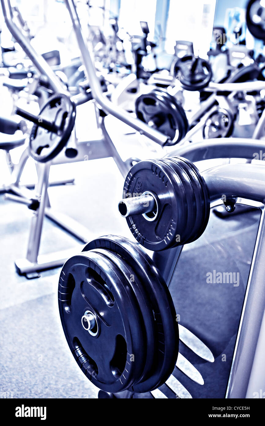 diverse equipment and machines at the gym room Stock Photo Alamy