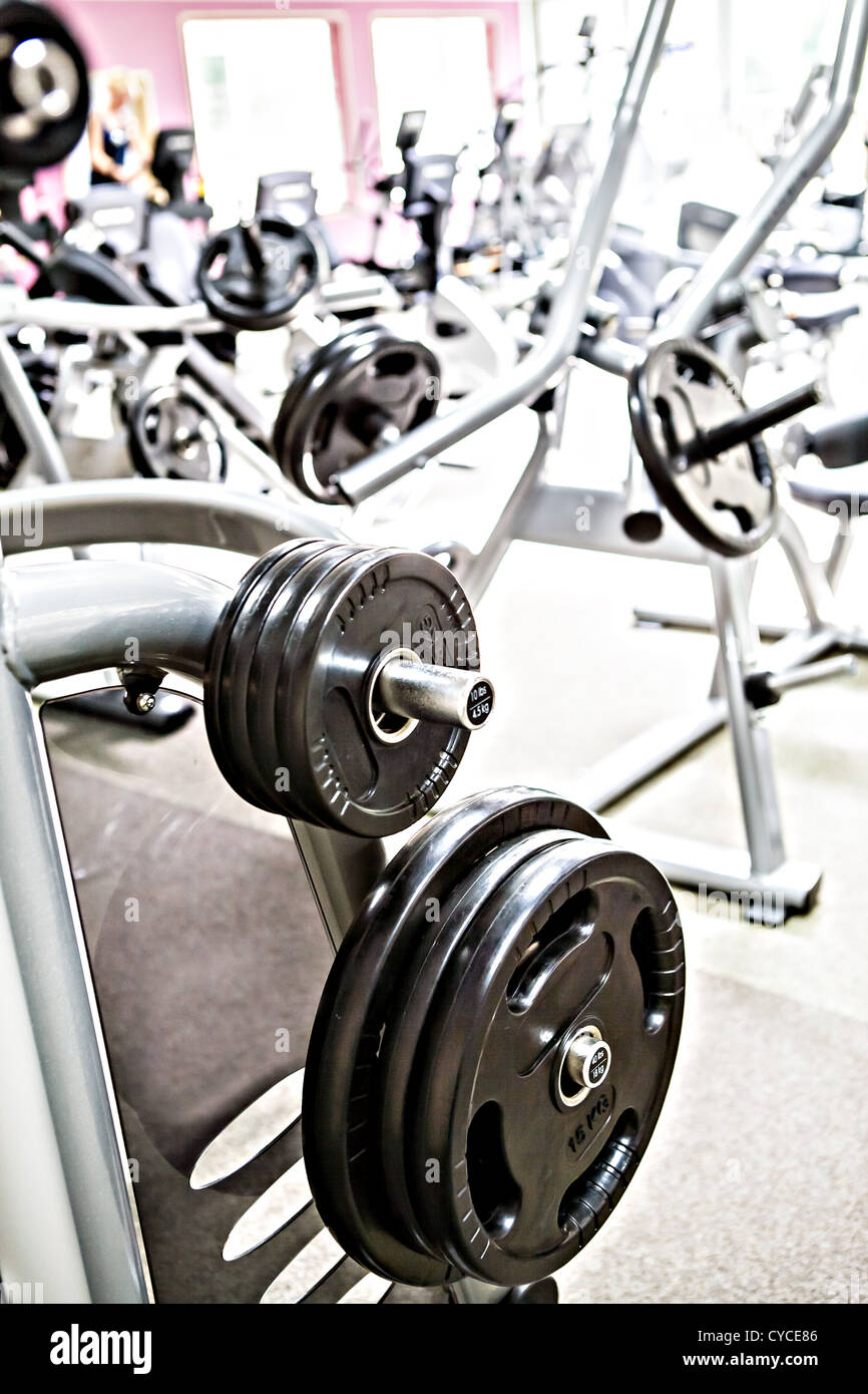 diverse equipment and machines at the gym room Stock Photo Alamy