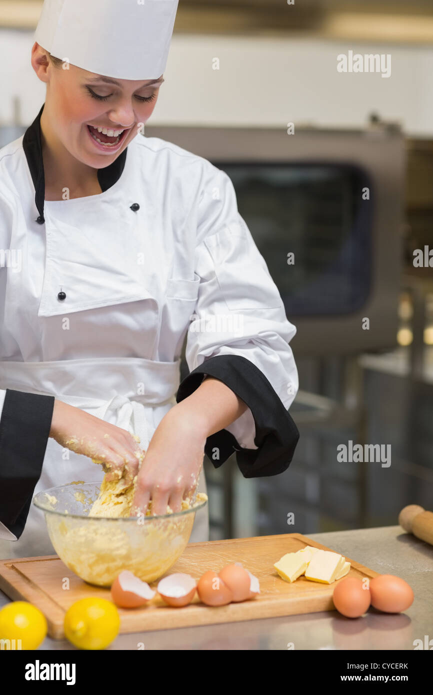 Pastry chef mixing dough Stock Photo