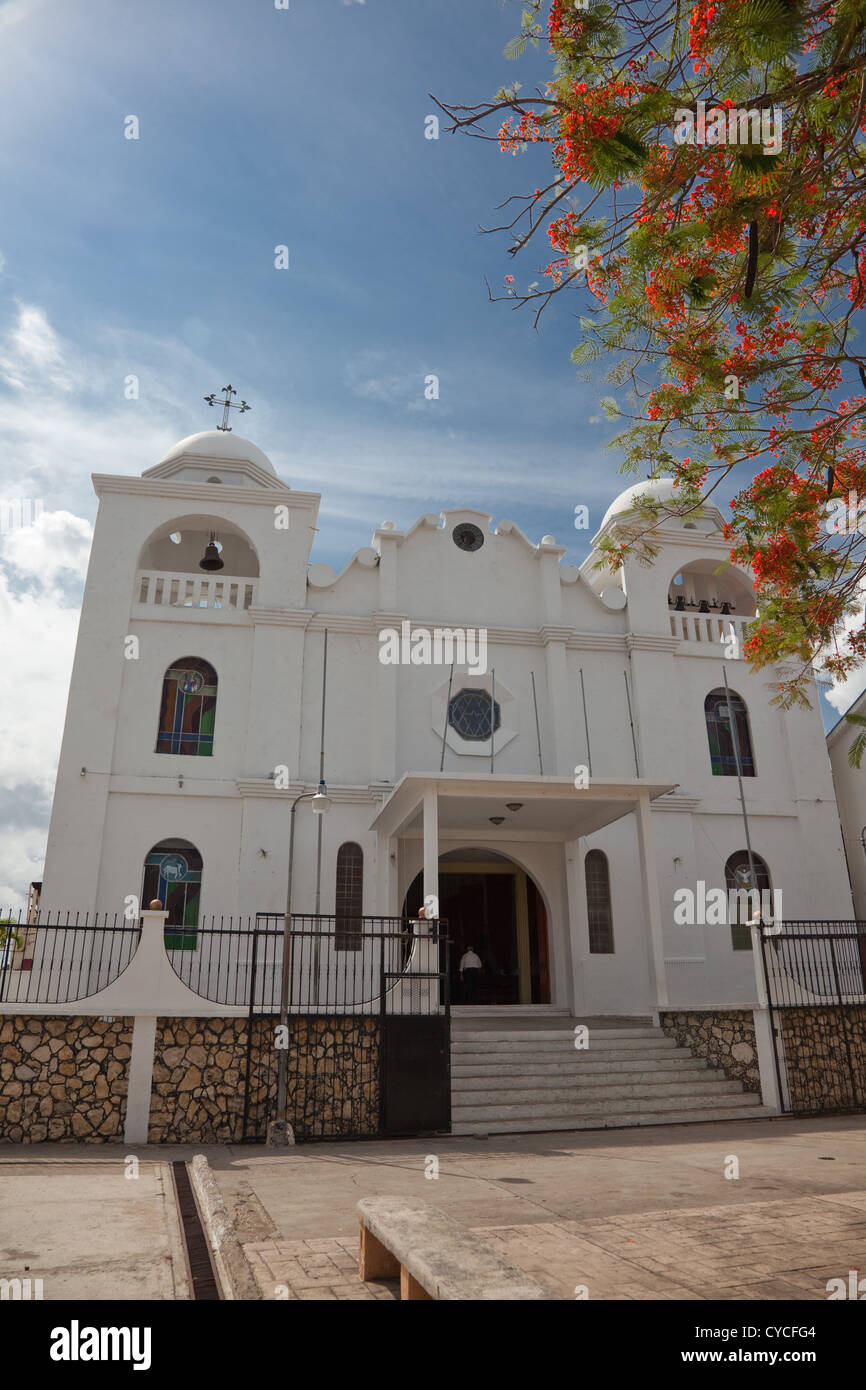 Church in the central town square on the charming little island of Flores in Lake Peten Itza.. Stock Photo