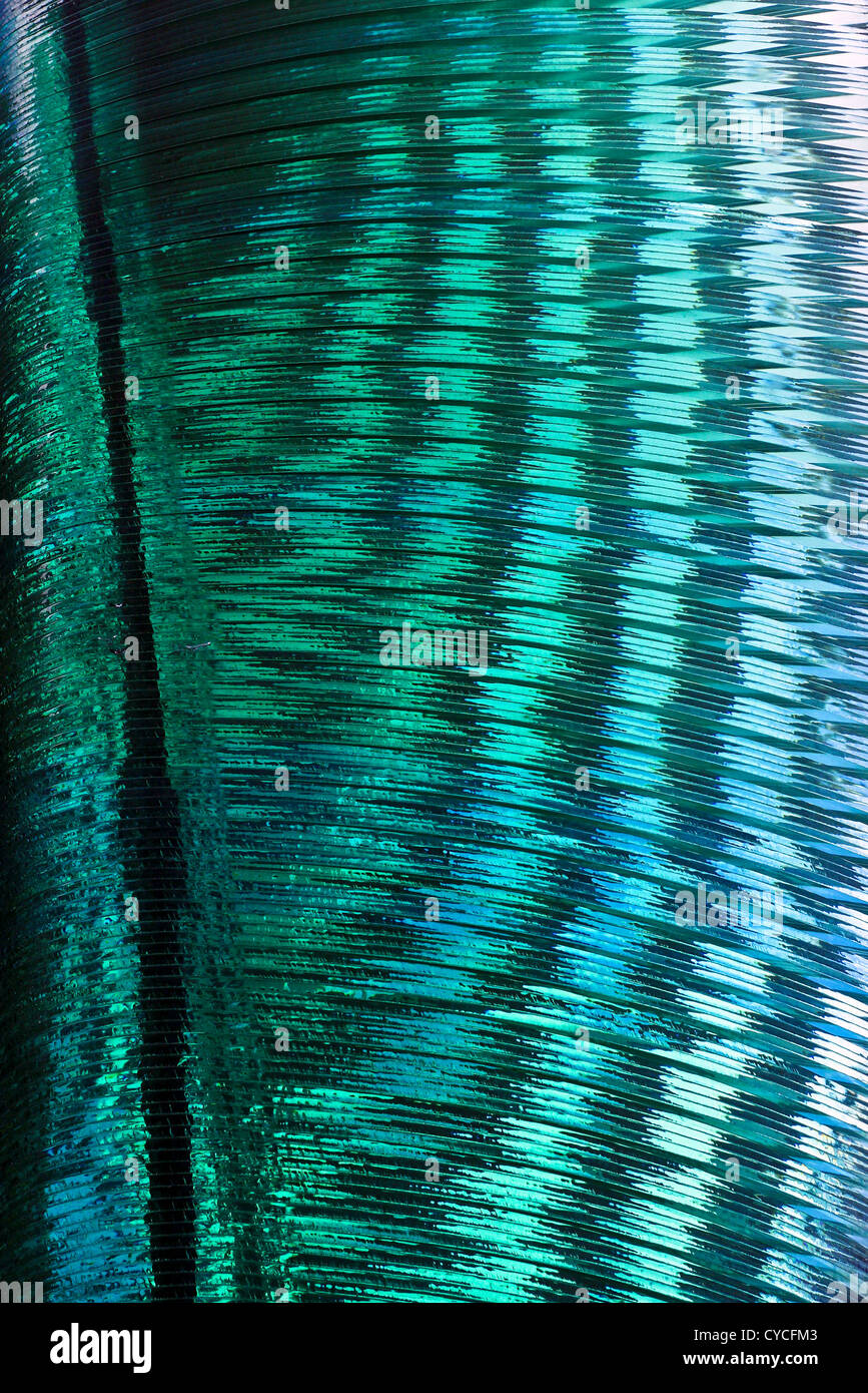 Beautiful torquoise glass sculpture,viewed from various angles in