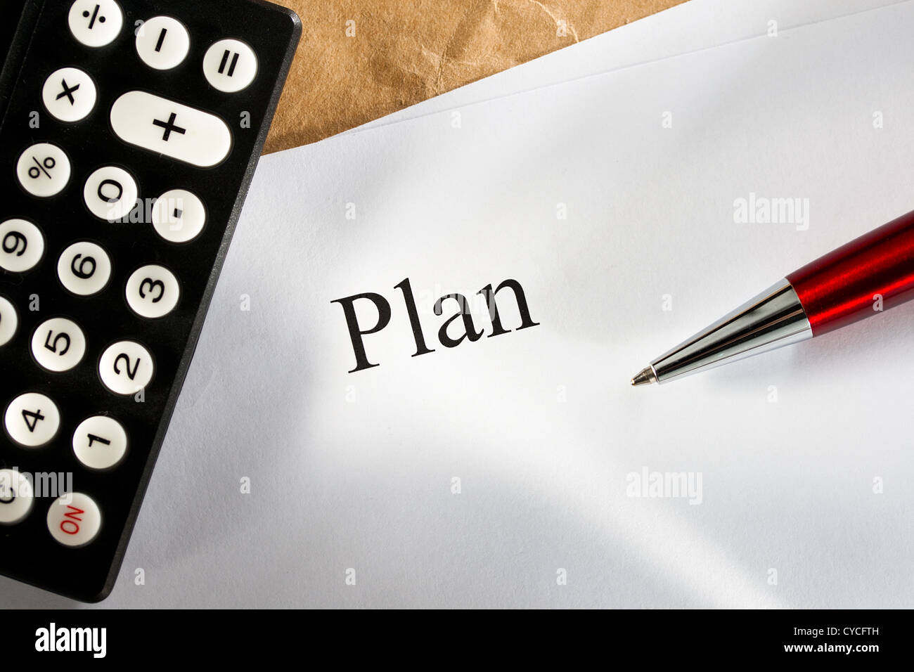 Plan conception with calculator Stock Photo
