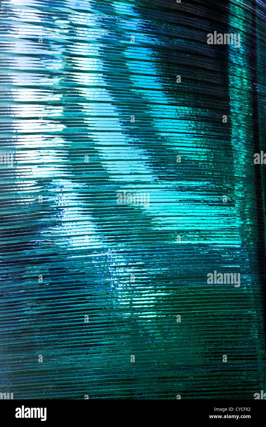 Beautiful torquoise glass sculpture,viewed from various angles in