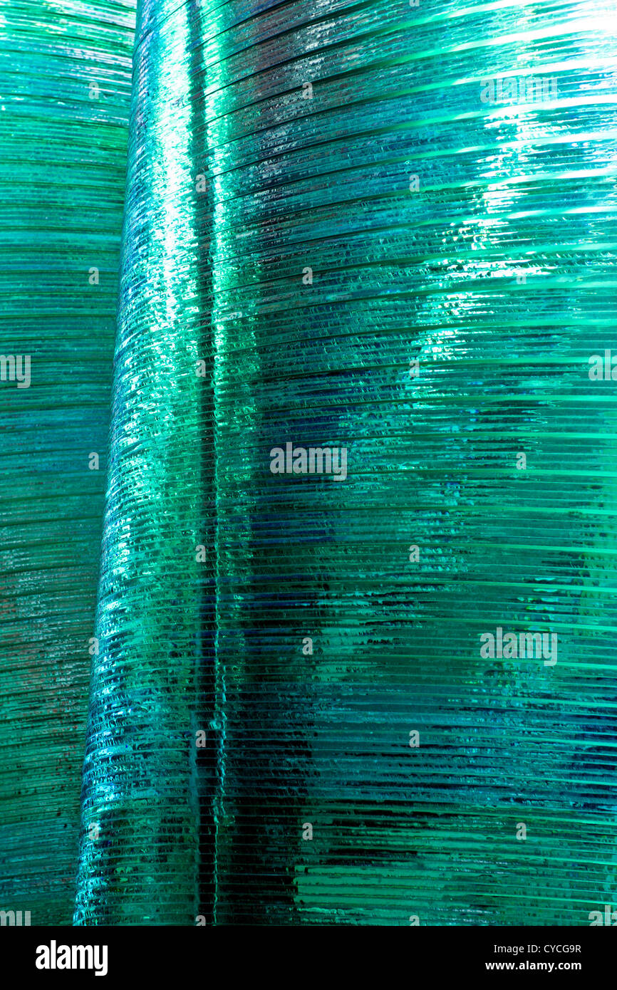 Beautiful torquoise glass sculpture,viewed from various angles in