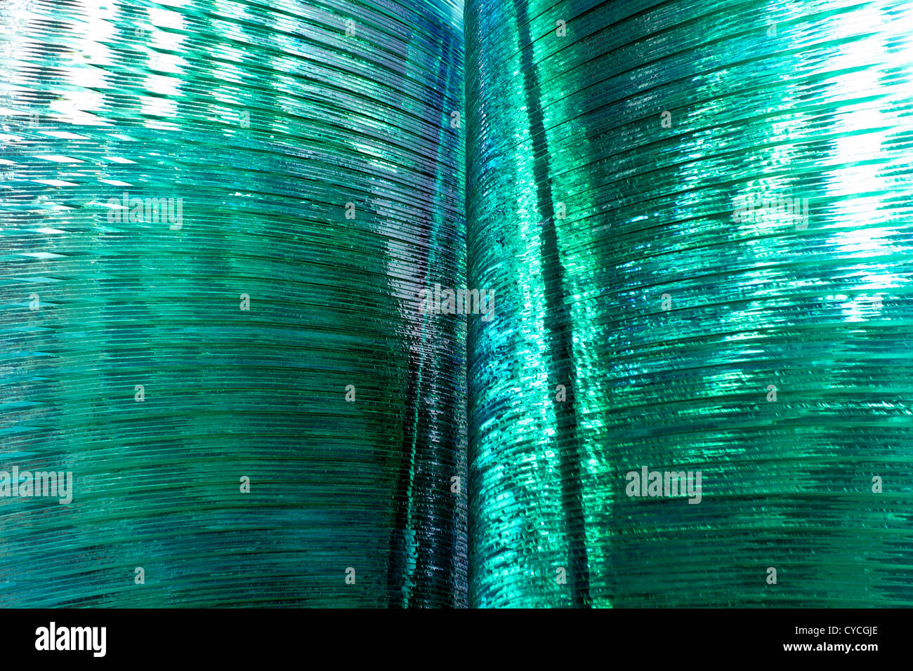 Beautiful torquoise glass sculpture,viewed from various angles in