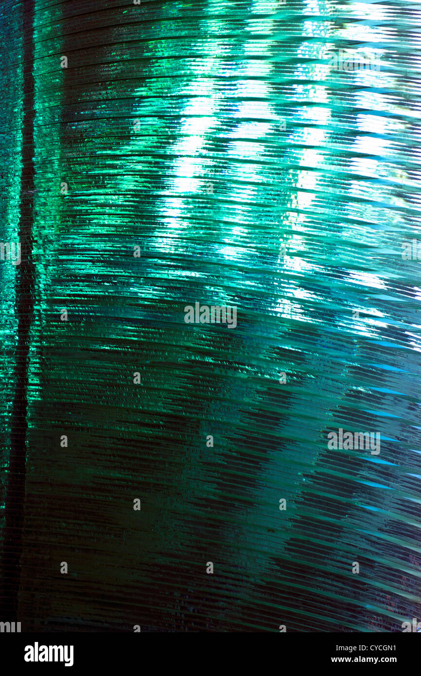 Beautiful torquoise glass sculpture,viewed from various angles in