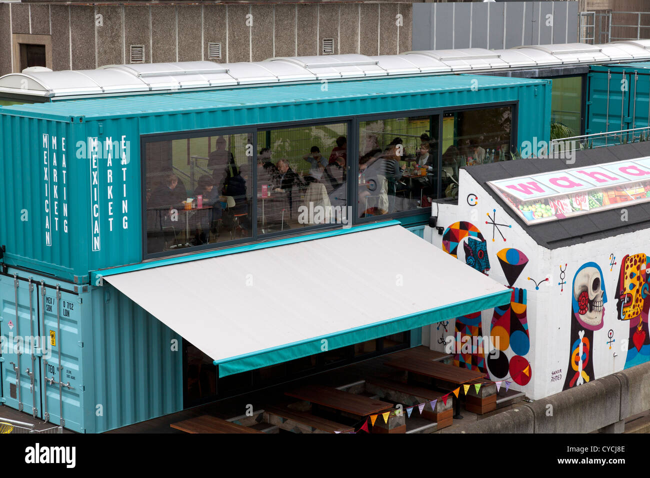 https://c8.alamy.com/comp/CYCJ8E/wahaca-mexican-restaurant-on-londons-south-bank-constructed-from-recycled-CYCJ8E.jpg
