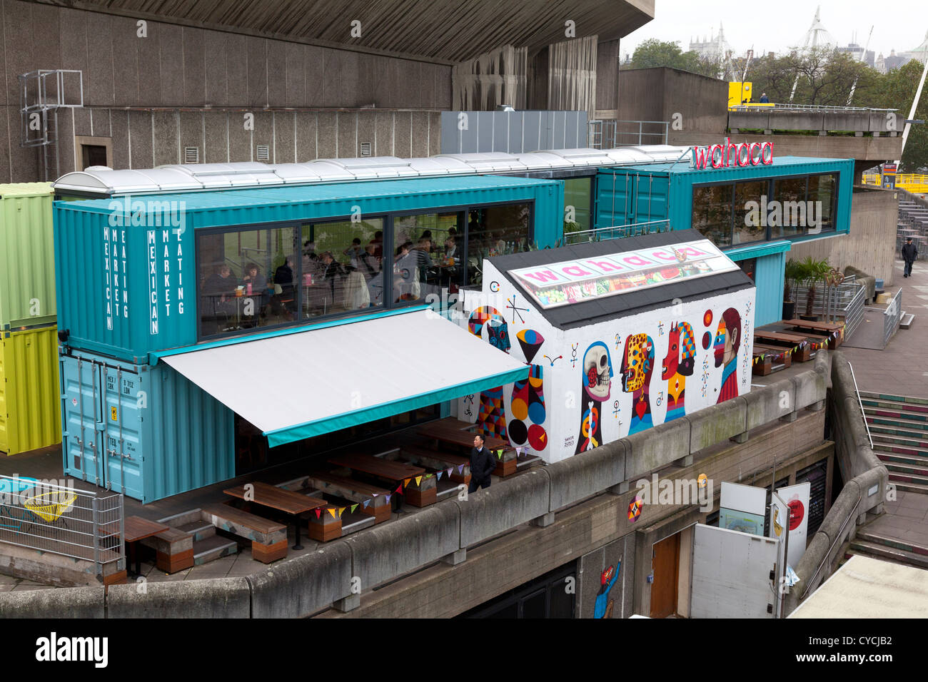 https://c8.alamy.com/comp/CYCJB2/wahaca-mexican-restaurant-on-londons-south-bank-constructed-from-recycled-CYCJB2.jpg